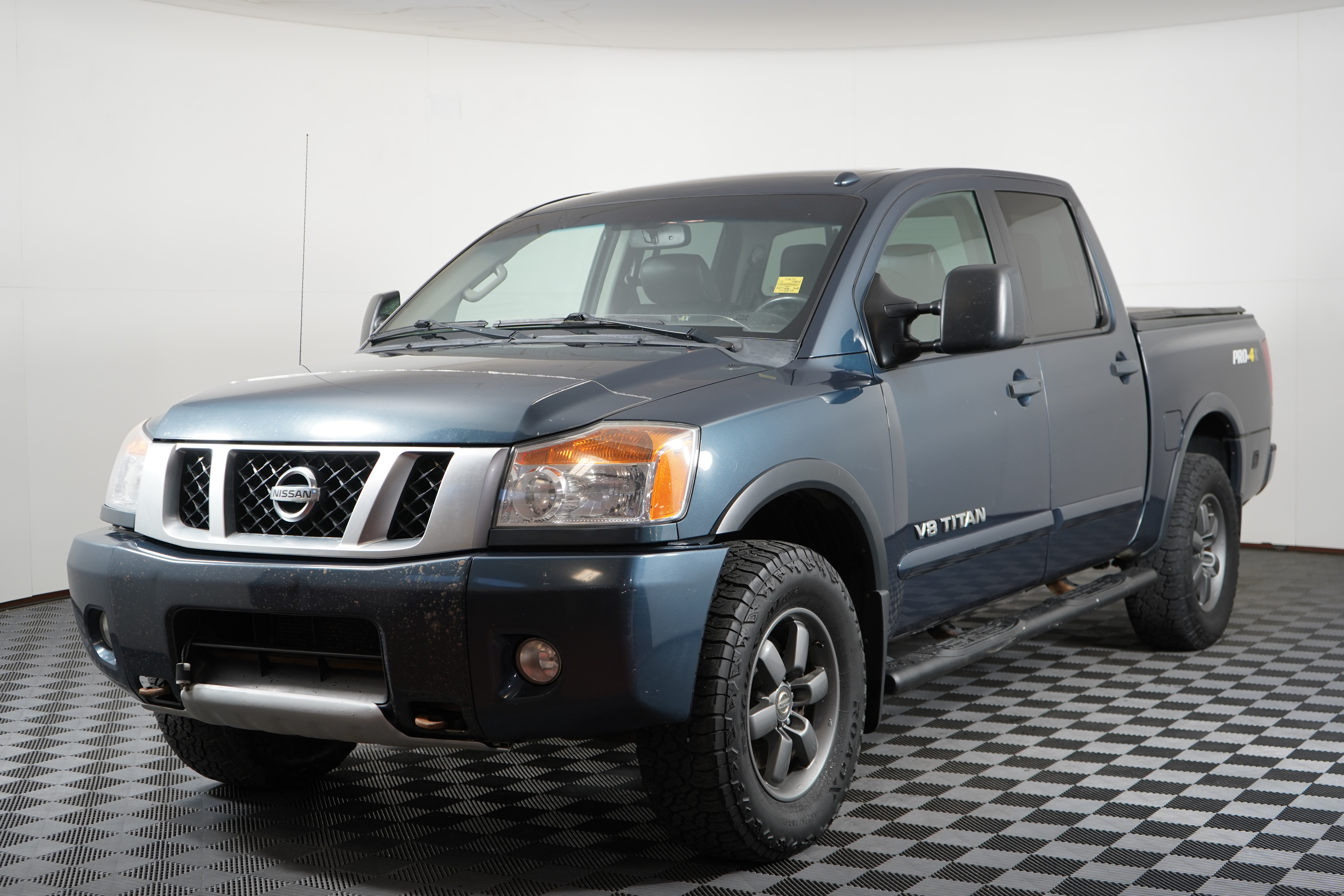 Blue 2015 Nissan Titan Pickup Truck Four-Wheel Drive Automatic