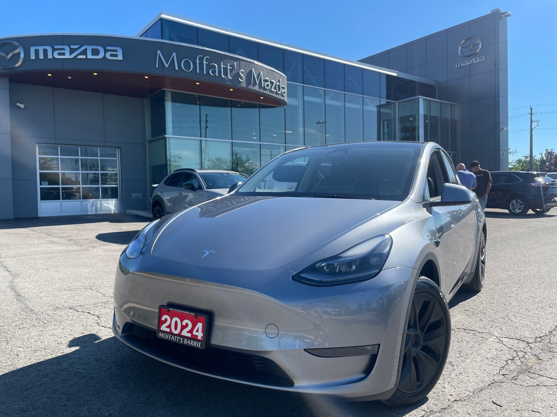 Silver 2024 Tesla Model Y SUV / Crossover All-Wheel Drive Automatic