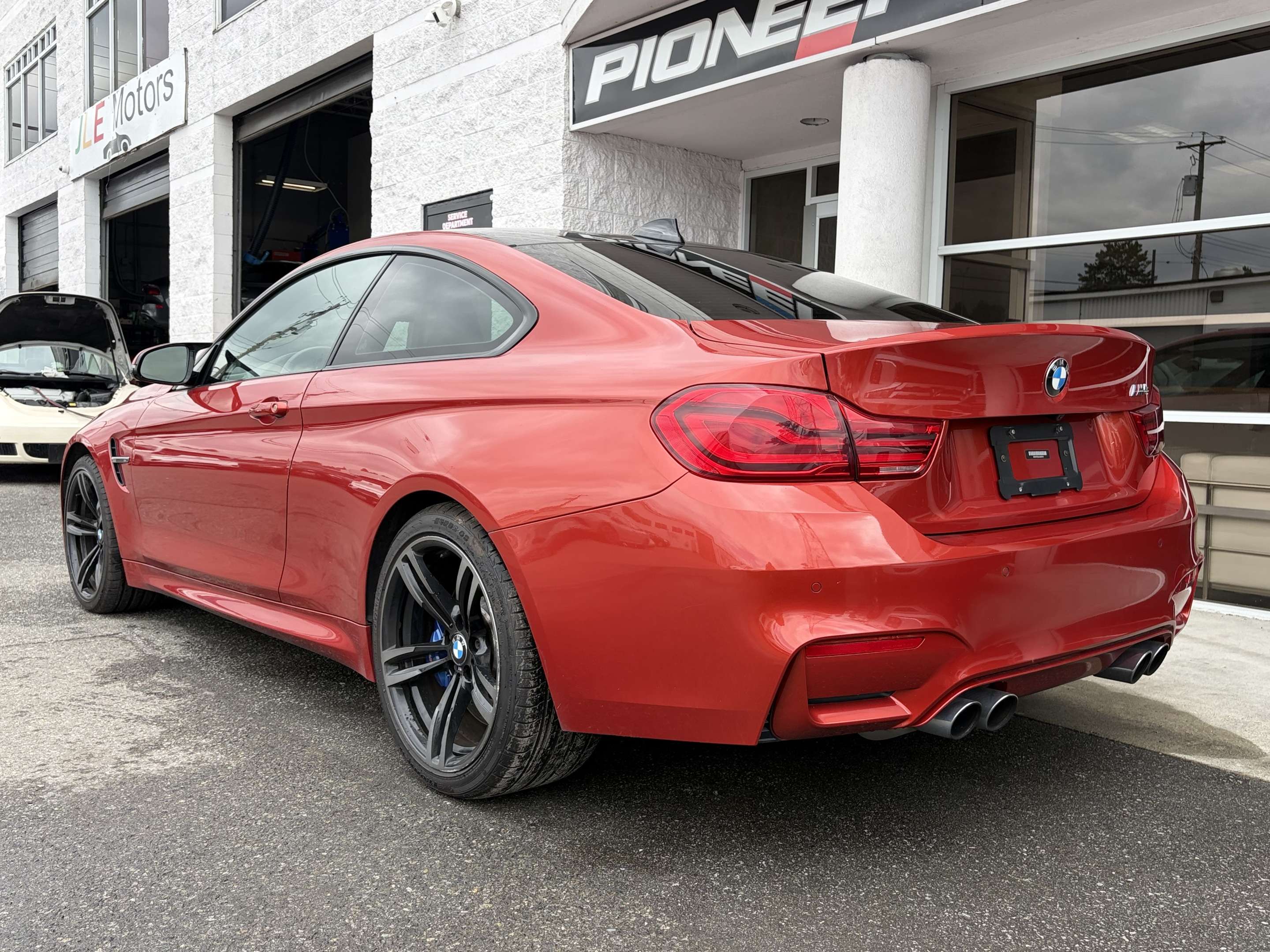Orange Metallic 2018 BMW M4 Coupe Rear-Wheel Drive Automatic