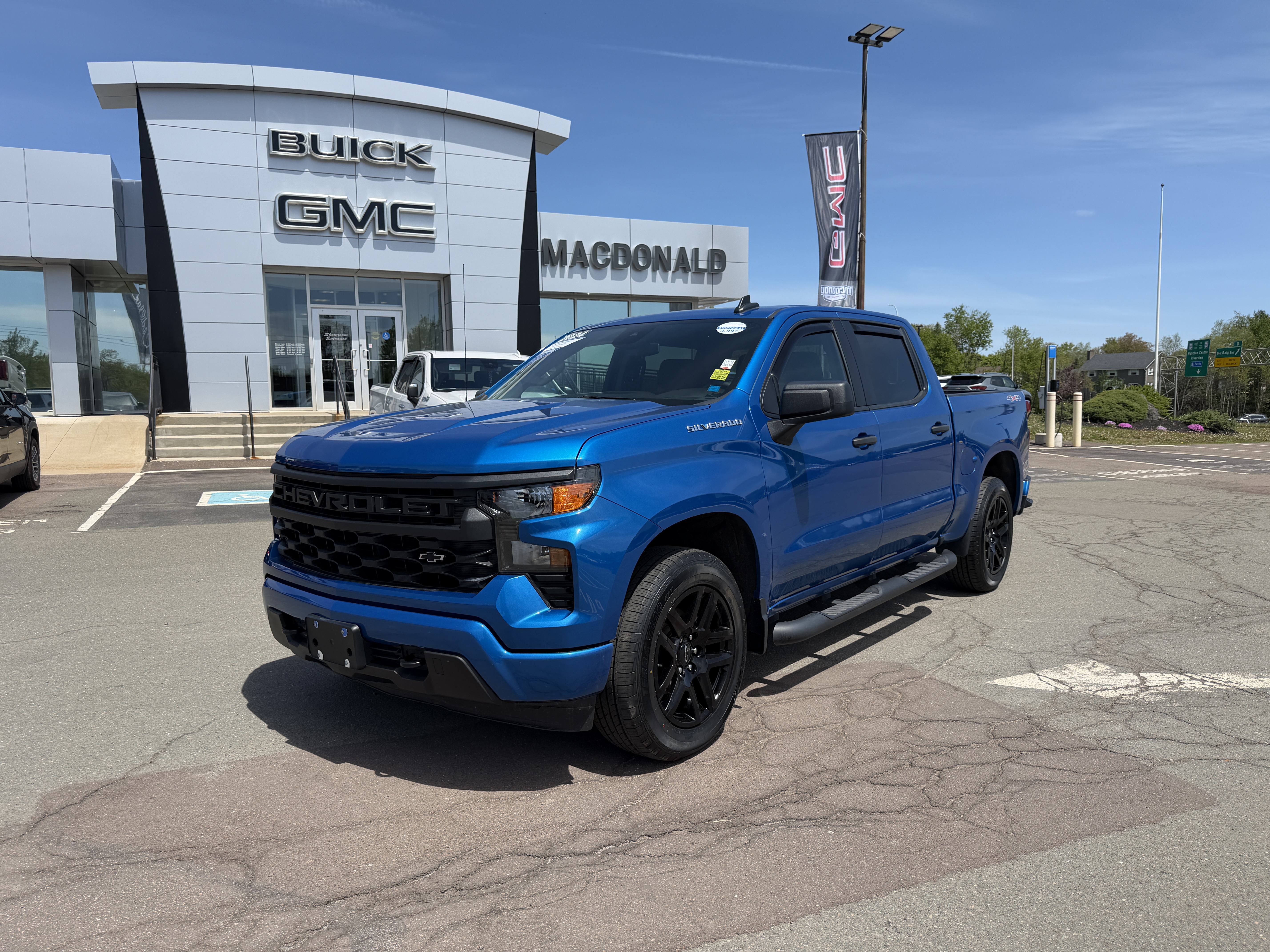 Glacier Blue Metallic 2024 Chevrolet Silverado 1500 Custom Crew Cab 4WD Pickup Truck Four-Wheel Drive Automatic