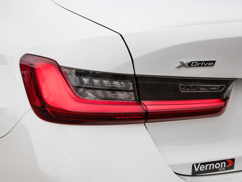 2023 BMW 3 Series 330e xDrive Ultimate Fuel Savings Meets Legendary BMW Performance - White exterior view 12