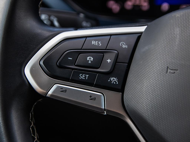 2024 Volkswagen Taos Comfortline 4MOTION Crisp LED Headlights, Sharp Body Lines, Total Head-Turner - Blue exterior view 18