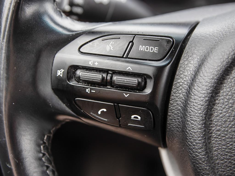 2023 Kia Rio 5-door LX+ Save Big at the Pump! Ultimate Budget-Friendly Commuter - Radiant Red exterior view 18