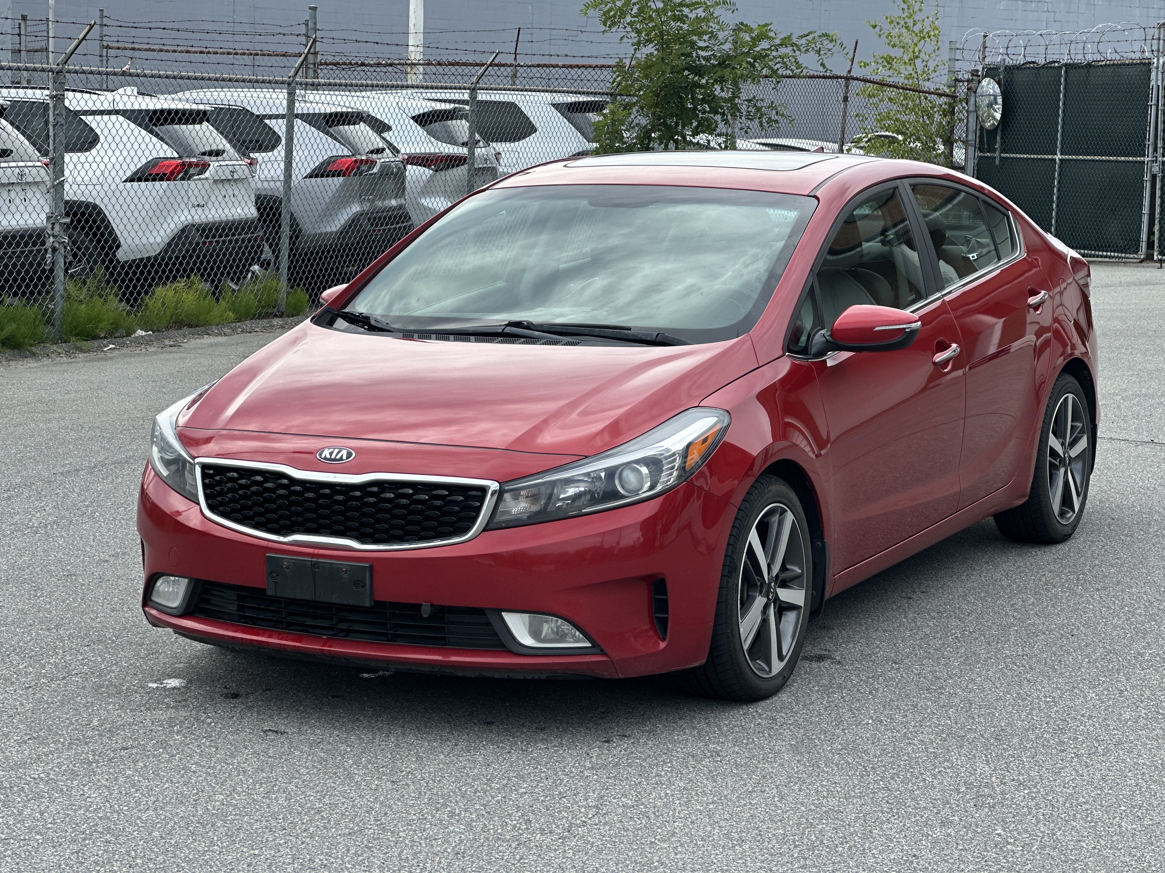 Radiant Red Metallic 2018 Kia Forte Sedan Front-Wheel Drive Automatic