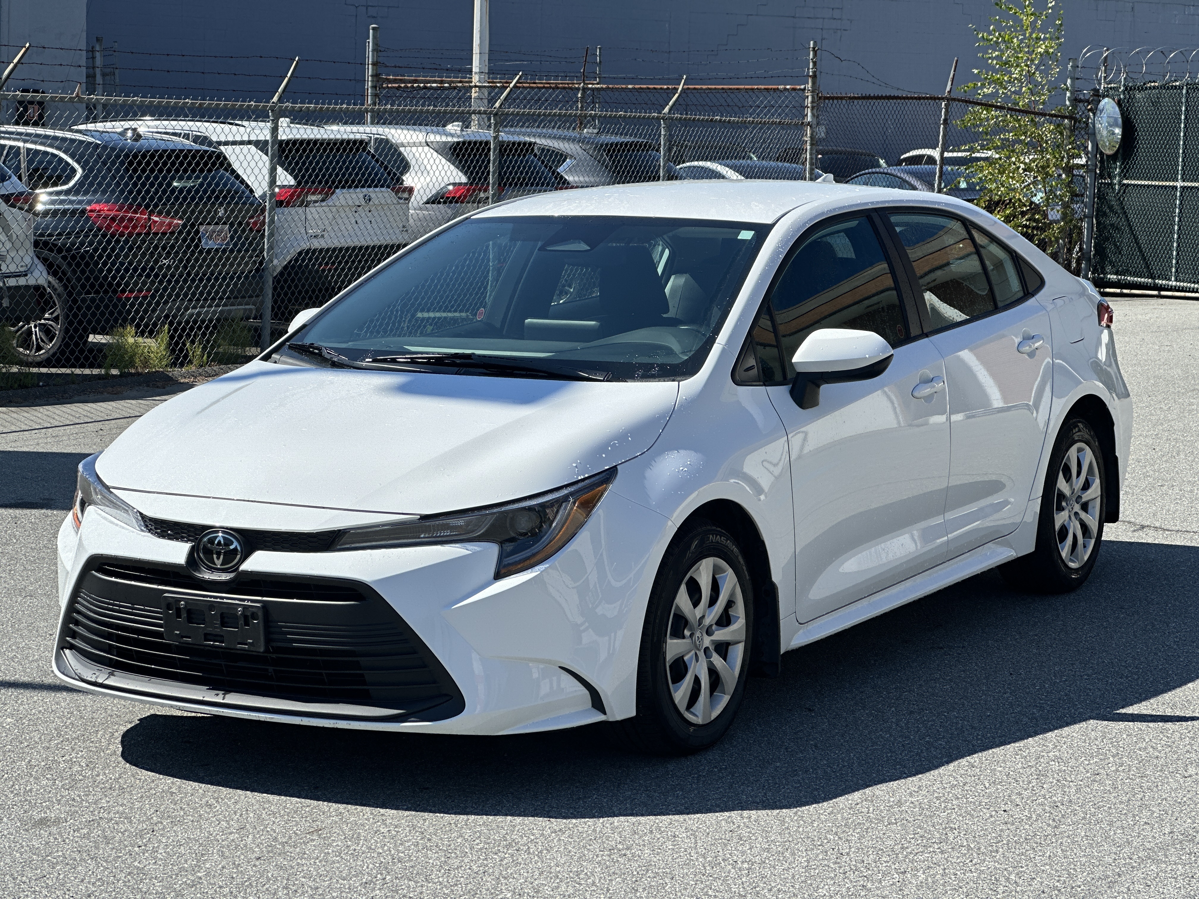 White 2024 Toyota Corolla Sedan Front-Wheel Drive Automatic