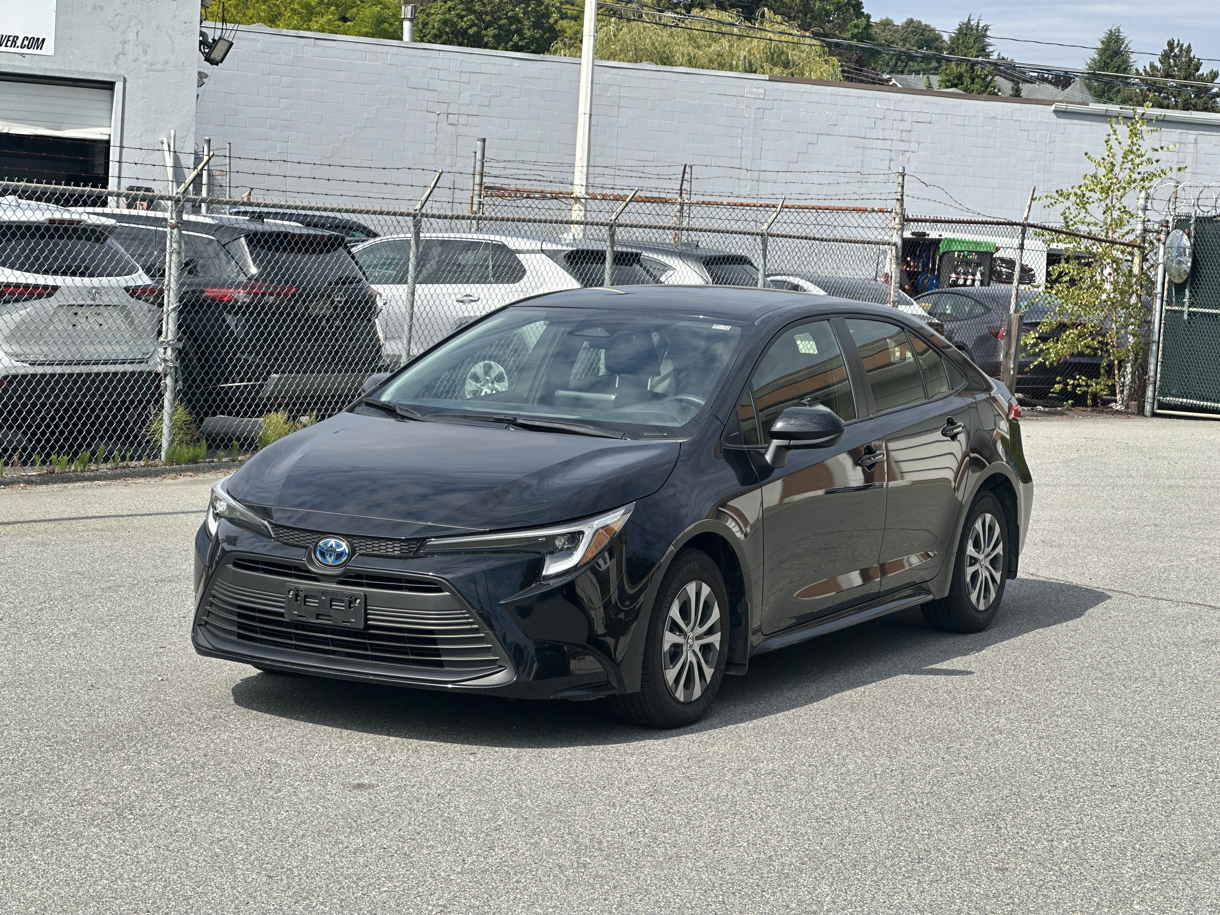 Midnight Black Metallic 2025 Toyota Corolla Hybrid Sedan Front-Wheel Drive Automatic